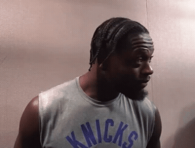 Man In Knicks Jersey Looking Left GIF