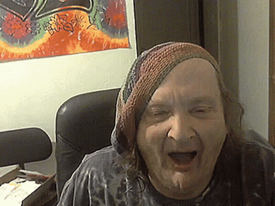Man In Knitted Hat Sitting By Crown Painting GIF
