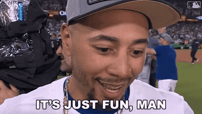 Man In LA Hat In Front Of Scoreboard GIF