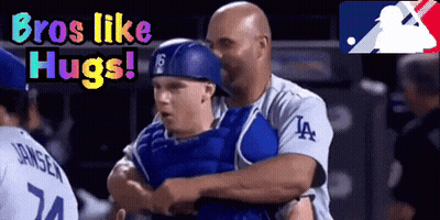 Man In LA Jersey Hugging Another Man GIF
