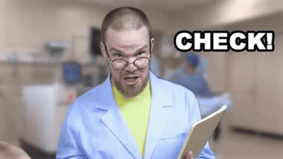Man In Lab Coat Holding Check Tablet GIF