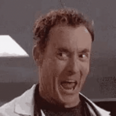 Man In Lab Coat Making Funny Face GIF