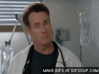 Man In Lab Coat Making Funny Face GIF