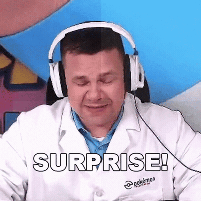Man In Lab Coat Surprised With Headphones GIF