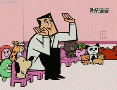 Man In Lab Coat Surrounded By Stuffed Animals GIF