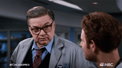 Man In Lab Coat Talking In Chicagomed Ad GIF