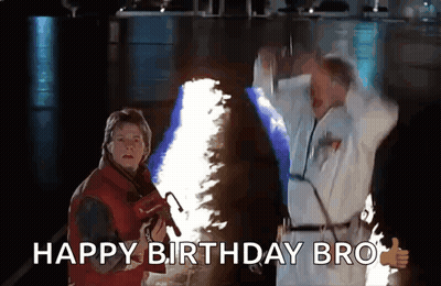 Man In Lab Coat Thumbs Up Man In Red Jacket Saying Happy Birthday Bro GIF