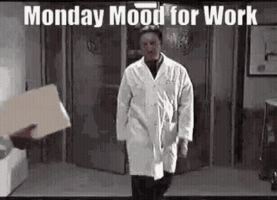 Man In Lab Coat Walking With Box GIF