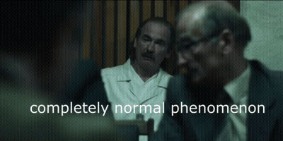 Man in Lab Coat With Completely Normal Phenomenon