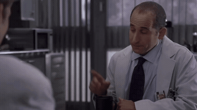 Man In Lab Coat With Smith Name Tag GIF