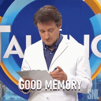 Man In Lab Coat Writing On Clipboard Saying Good Memory GIF