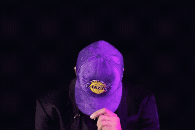 Man In Lakers Hat And Suit Making A Face GIF
