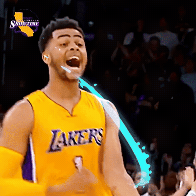 Man in Lakers Jersey Celebrating
