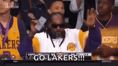 Man In Lakers Jersey Watching Basketball GIF