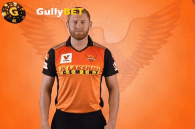 Man In Lakshmi Cement Shirt Holding Flower GIF
