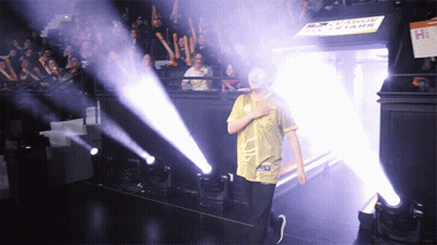 Man In League All Star Shirt Walking Through Tunnel Of Lights GIF
