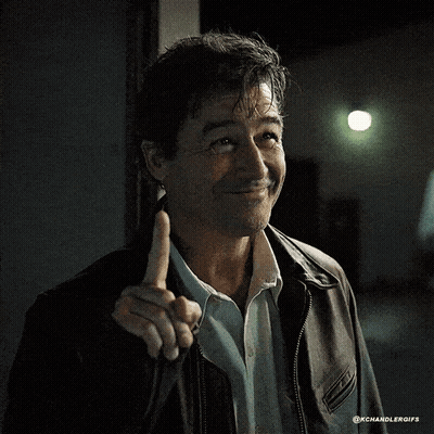Man In Leather Jacket And Blue Shirt Giving Middle Finger GIF