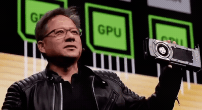 Man In Leather Jacket And Glasses Holding GPU GIF