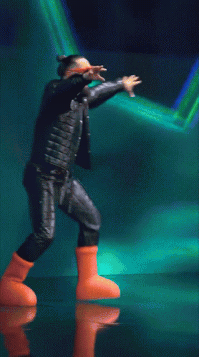 Man In Leather Jacket And Orange Boots Dancing GIF