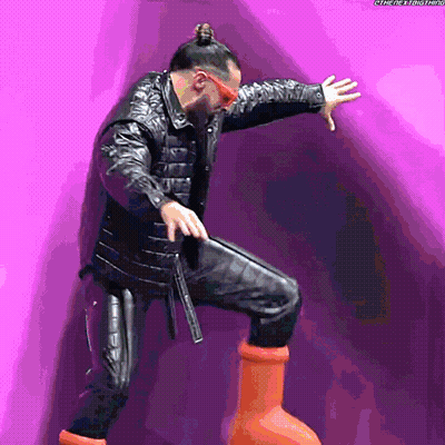 Man In Leather Jacket And Sunglasses On Pipe GIF