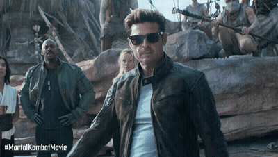 Man In Leather Jacket And Sunglasses With Mortal Kombat Movie GIF