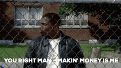 Man In Leather Jacket Behind Chain Link Fence GIF