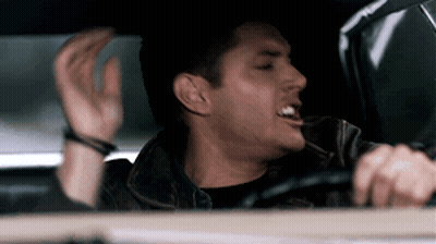 Man In Leather Jacket Driving Car GIF