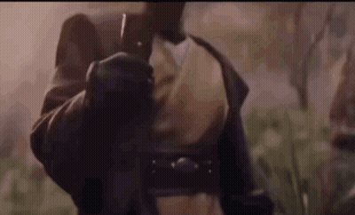Man In Leather Jacket Holding Gun GIF