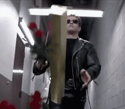 Man In Leather Jacket Holding Wooden Cross And Roses GIF