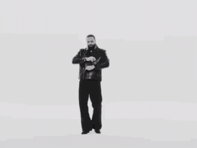 Man In Leather Jacket In Black And White Photo GIF