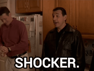 Man In Leather Jacket In Front Of Refrigerator Saying Shocker GIF