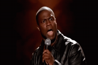 Man In Leather Jacket Making Funny Face At Microphone GIF