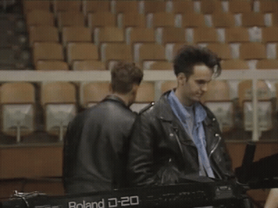 Man In Leather Jacket Playing Roland Keyboard GIF
