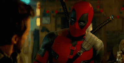 Man In Leather Jacket Pointing At Deadpool GIF