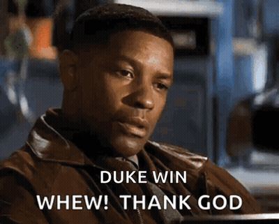 Man In Leather Jacket Saying Duke Win Whew GIF