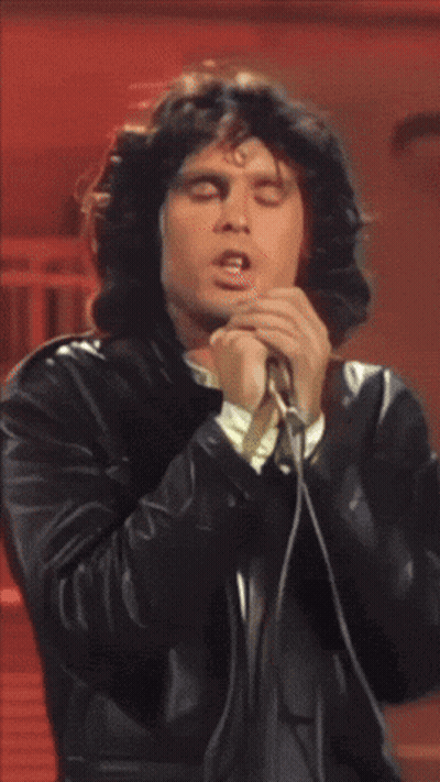 Man In Leather Jacket Singing GIF