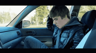 Man In Leather Jacket Sitting In Car GIF