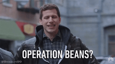 Man In Leather Jacket Smiling Operation Beans GIF