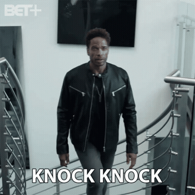 Man In Leather Jacket Walking Down Stairs GIF