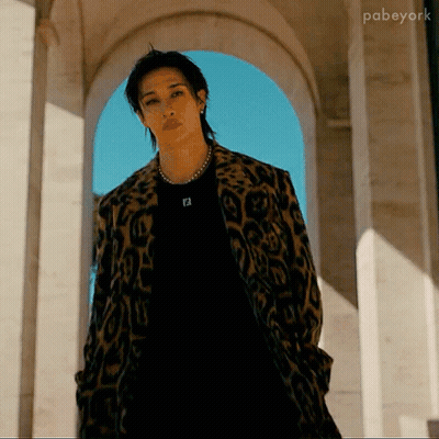 Man In Leopard Print Coat And Black Shirt With Letter F GIF