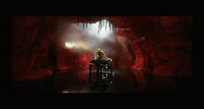 Man In Leopard Print Jacket In Cave GIF