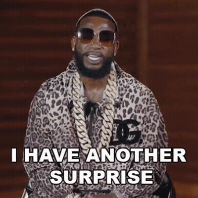 Man In Leopard Print Jacket Says Surprise GIF