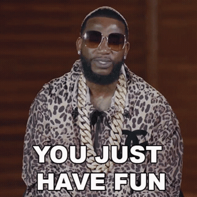 Man In Leopard Print Jacket Says You Just Have Fun GIF