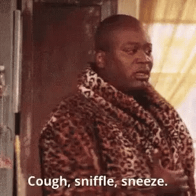 Man In Leopard Print Robe Saying Cough Sniffle Sneeze GIF