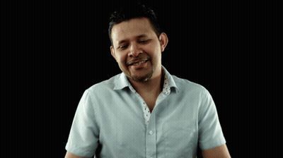Man In Light Blue Shirt Making Funny Face GIF