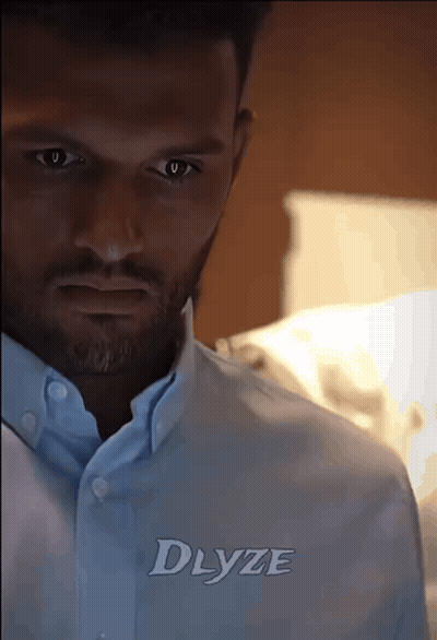 Man In Light Blue Shirt With Dlyze GIF