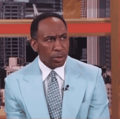 Man In Light Blue Suit With Microphone GIF