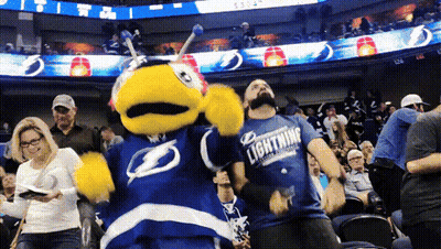 Man In Lightning Shirt Dancing With Mascot GIF