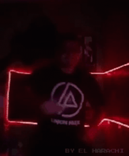 Man In Linkin Park Shirt In Green Light GIF