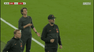 Man In Liverpool Sweatshirt Shaking Hands GIF